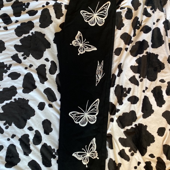 Black jeans with butterfly prom on front - Picture 3 of 3